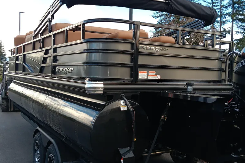 Slide: The Image of 2026 Ranger 223FC pontoon boat with sleek black exterior and tan seating. - 3