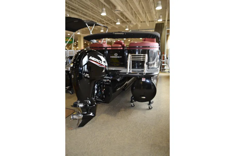 Slide: The Image of Top view of 2026 Regency 230 DL boat interior with luxurious seating and storage compartments. - 7