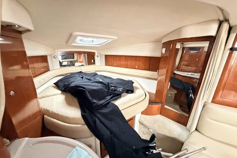 Slide: The Image of Luxurious interior cabin of 2007 Sea Ray 340 Sundancer yacht with plush seating. - 36