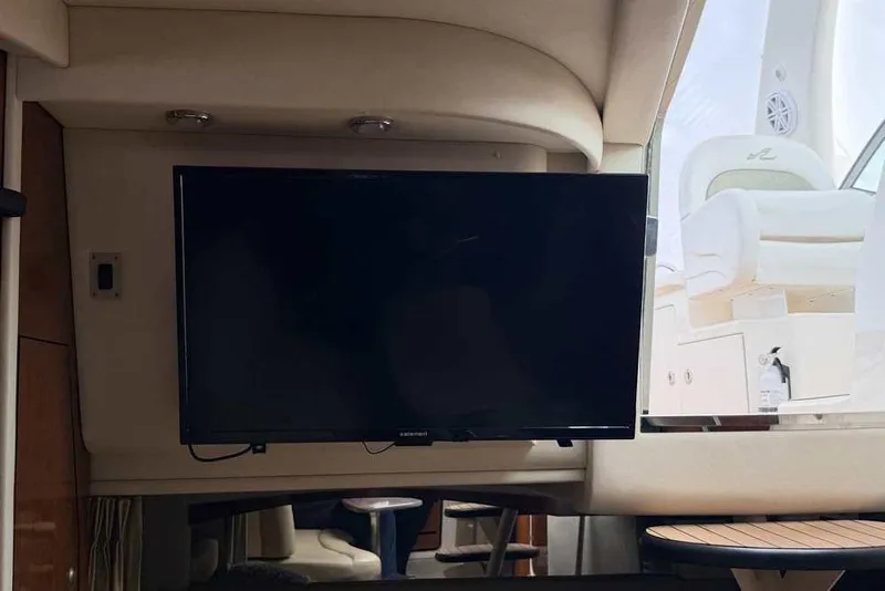 Slide: The Image of Interior of 2007 Sea Ray 340 Sundancer with mounted flat-screen TV. - 40