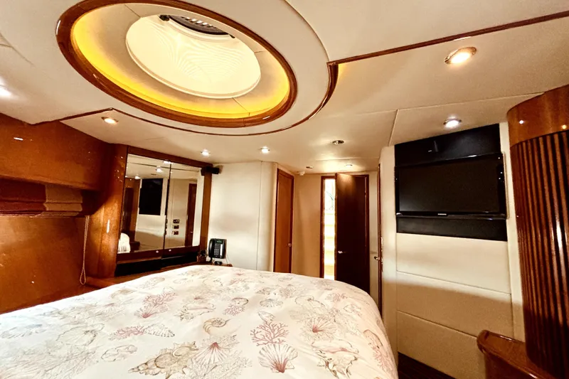 Slide: The Image of Luxurious bedroom interior of 2005 Sunseeker 75 Yacht with elegant lighting and modern amenities. - 24