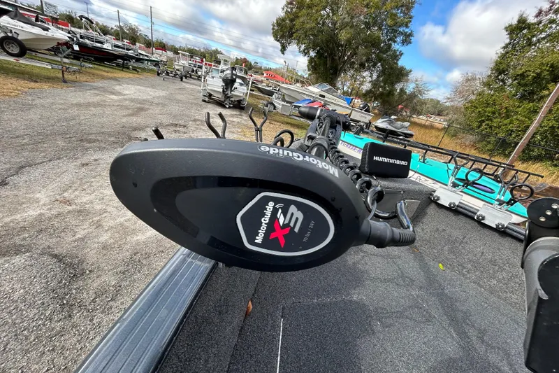 Slide: The Image of 2021 Lund 1675 Adventure SS with MotorGuide X3 trolling motor in a boatyard. - 14