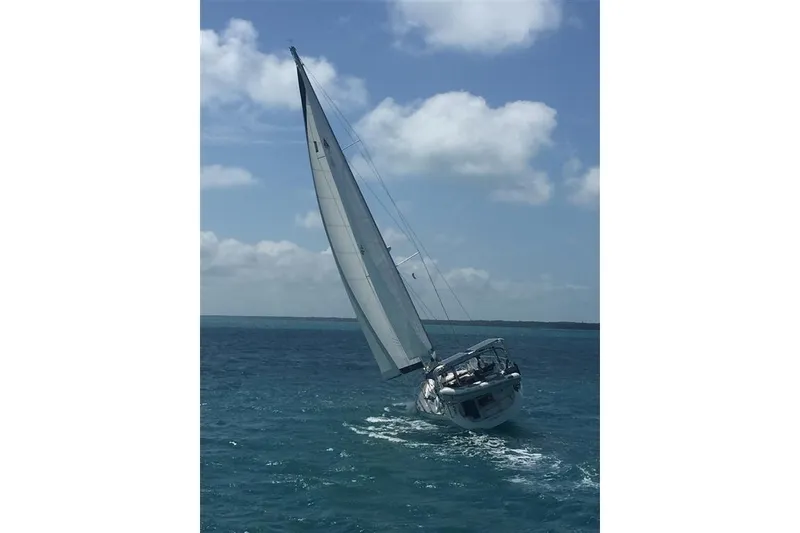 Slide: The Image of Sailing yacht Catalina 470 (2000) navigating on open sea under clear skies. - 20