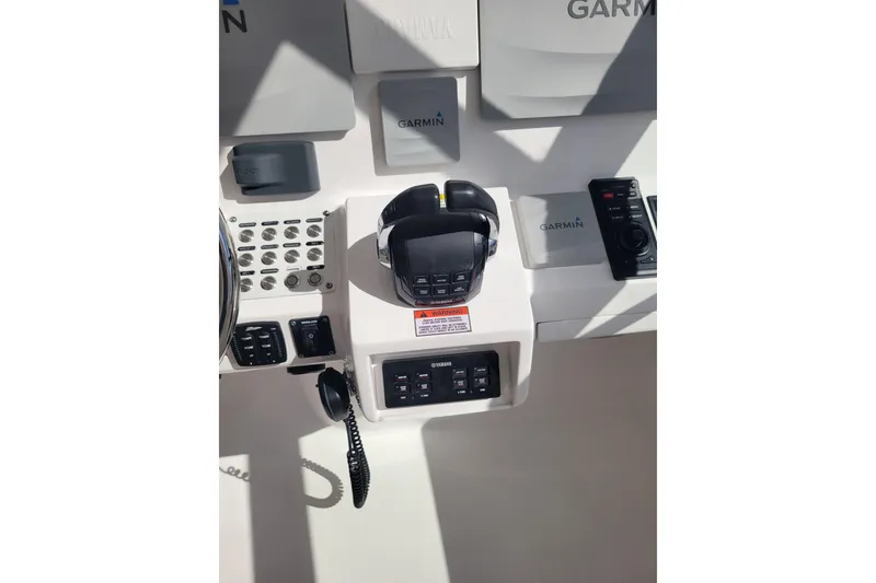 Slide: The Image of Control panel of a 2016 Intrepid 475 Sport Yacht with Garmin electronics. - 10
