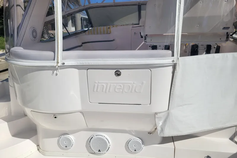 Slide: The Image of 2016 Intrepid 475 Sport Yacht, rear view with seating and speakers. - 5