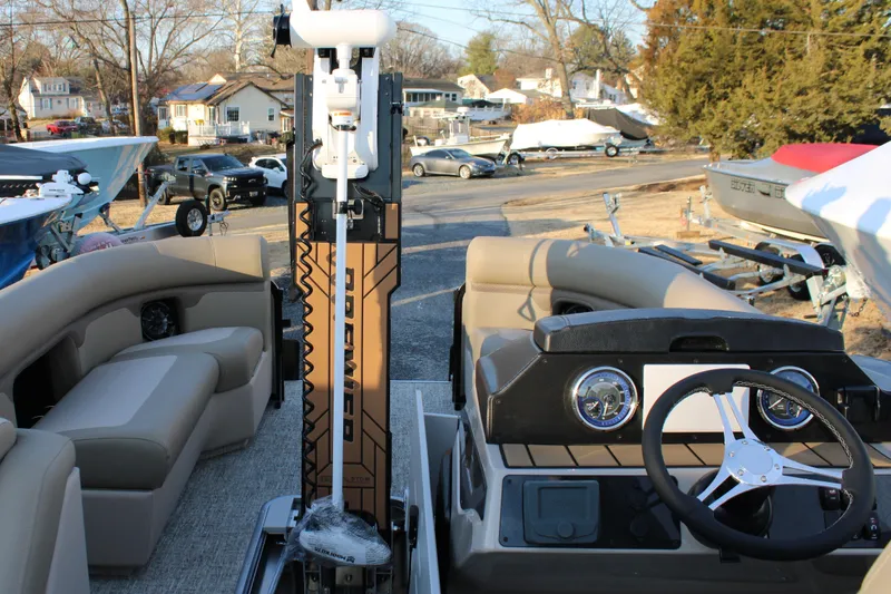 Slide: The Image of Premier 230 Sunsation Angler 2pt 2026 boat interior with steering wheel and seating. - 15