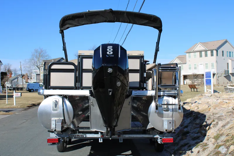 Slide: The Image of 2026 Premier 230 Sunsation Angler 2pt pontoon boat with powerful V6 engine on trailer. - 3