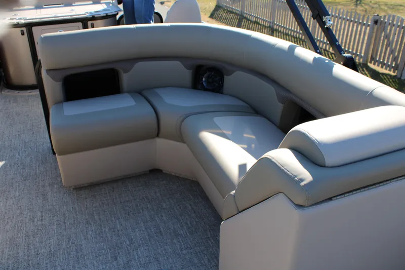 Slide: The Image of 2026 Premier 230 Sunsation Angler 2pt boat interior with plush seating and modern design. - 7