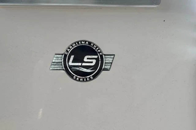 Slide: The Image of 2026 Carolina Skiff 25 LS logo on boat exterior. - 14