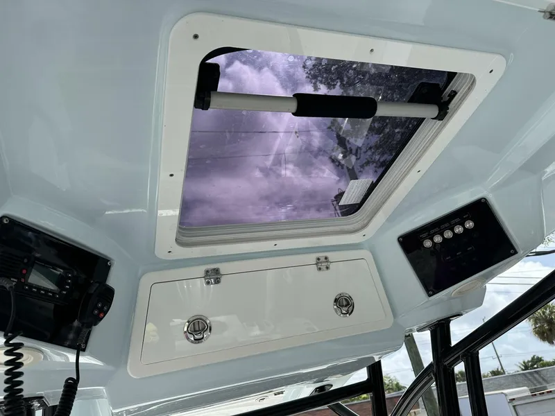 Slide: The Image of Interior view of 2022 Sea Fox 288 Commander boat with hatch and control panel. - 16