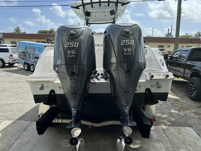 Slide: The Image of 2022 Sea Fox 288 Commander with twin 250 V6 outboard engines, rear view. - 3
