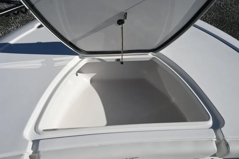 Slide: The Image of Open storage compartment on 2026 Tidewater 2500 Carolina Bay boat. - 19