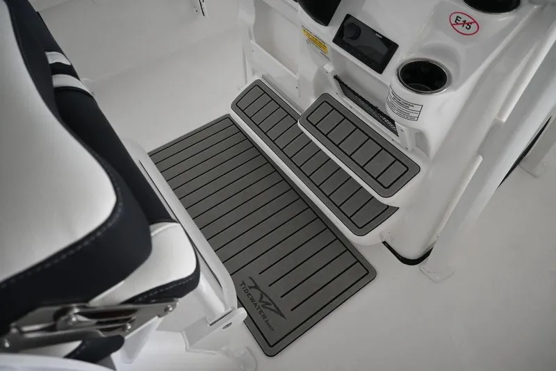 Slide: The Image of Interior of 2026 Tidewater 2110 Bay Max boat with non-slip flooring and seating. - 11