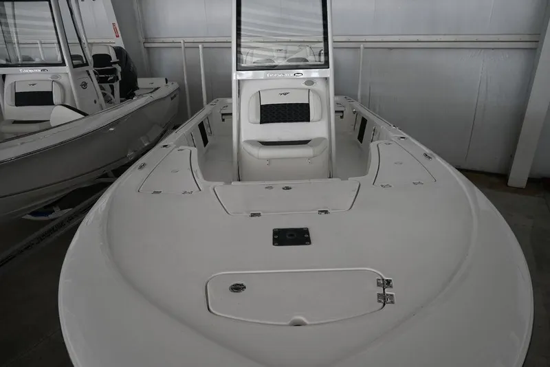Slide: The Image of 2026 Tidewater 2110 Bay Max boat in showroom, front view. - 4