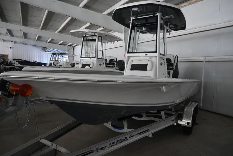 Slide: The Image of 2026 Tidewater 2110 Bay Max boat on trailer in indoor showroom. - 5