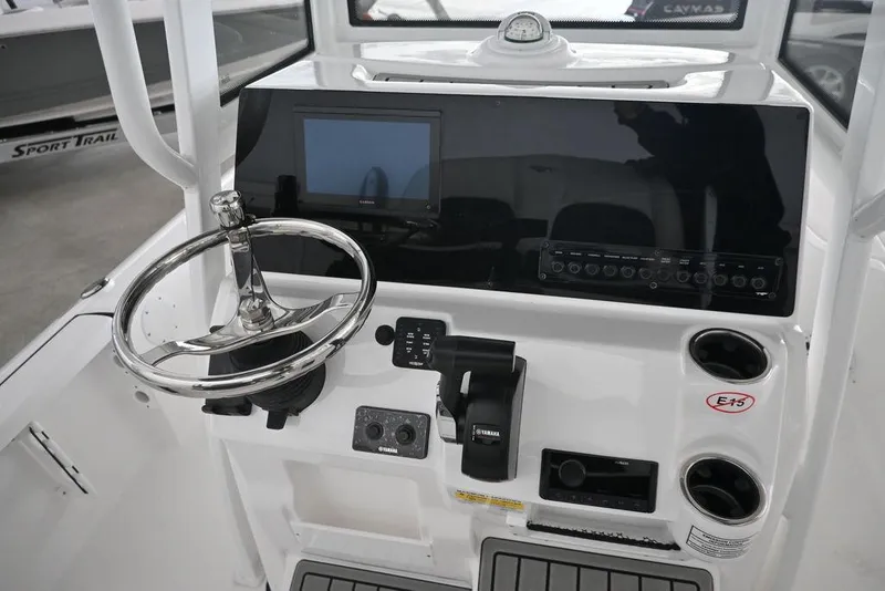 Slide: The Image of 2026 Tidewater 2110 Bay Max boat console with steering wheel and control panel. - 9