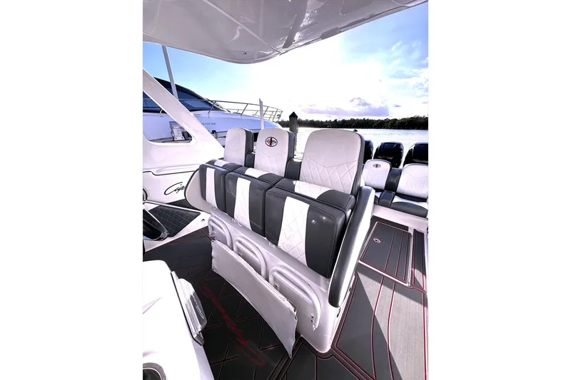 Slide: The Image of 2017 Cigarette 39' GTS boat interior with luxurious seating and sleek design. - 6