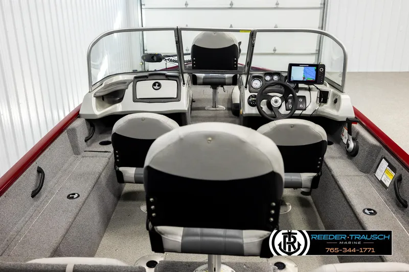 Slide: The Image of 2017 Tracker Pro Guide V-175 Combo boat interior with steering console and seating. - 11