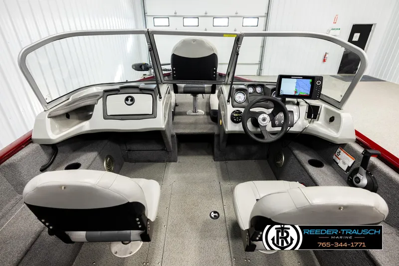Slide: The Image of 2017 Tracker Pro Guide V-175 Combo boat interior with steering console and seating. - 12