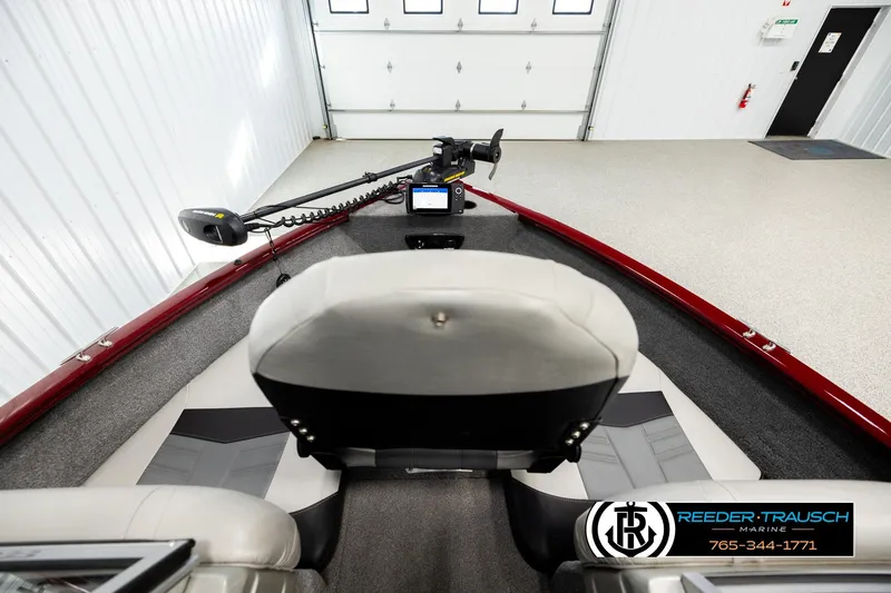 Slide: The Image of 2017 Tracker Pro Guide V-175 Combo boat interior with steering console and seating. - 13