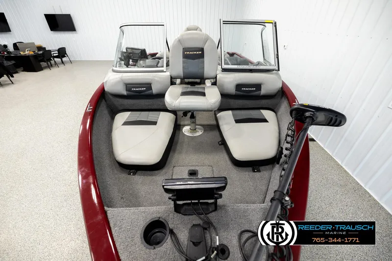 Slide: The Image of 2017 Tracker Pro Guide V-175 Combo boat interior with seating and control panel. - 14