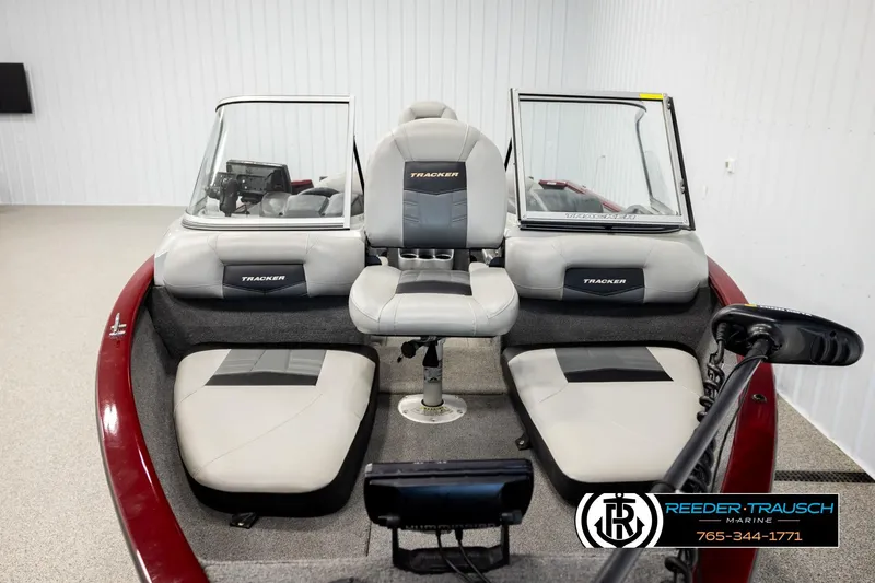 Slide: The Image of 2017 Tracker Pro Guide V-175 Combo boat interior with seating and steering console. - 19