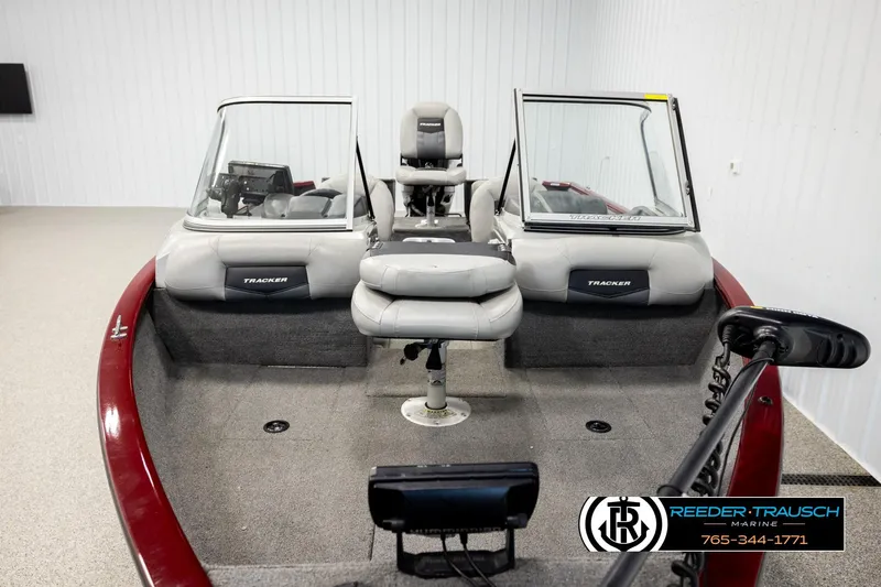 Slide: The Image of 2017 Tracker Pro Guide V-175 Combo boat interior with seating and control panel. - 20