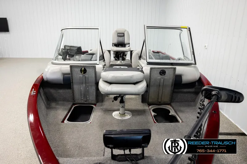 Slide: The Image of 2017 Tracker Pro Guide V-175 Combo boat interior with seating and storage compartments. - 21