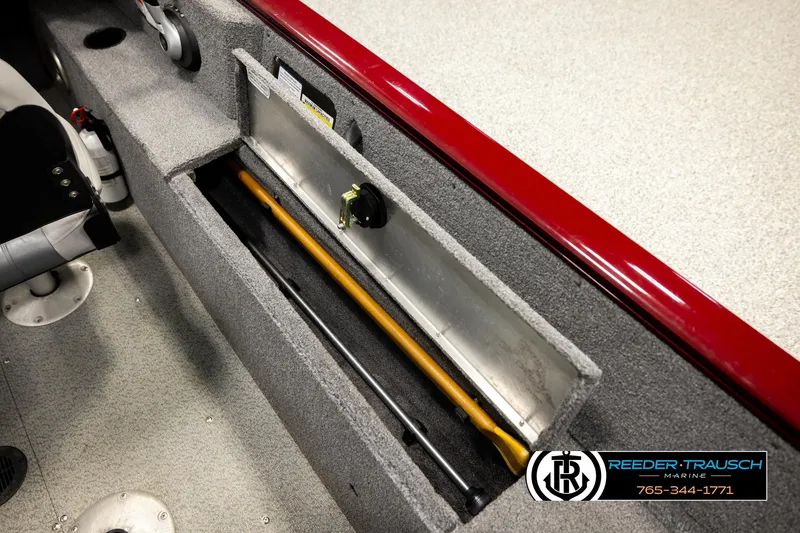 Slide: The Image of 2017 Tracker Pro Guide V-175 Combo boat interior with rod storage compartment. - 23