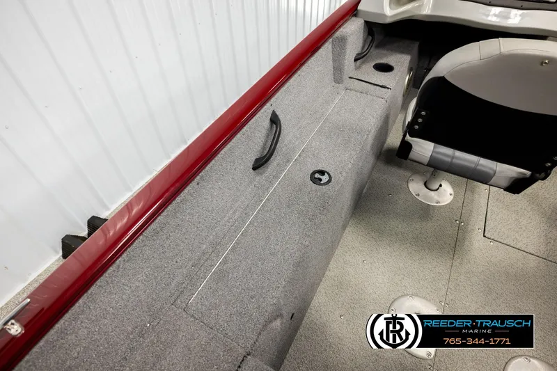 Slide: The Image of 2017 Tracker Pro Guide V-175 Combo interior with gray carpet and seating. - 24