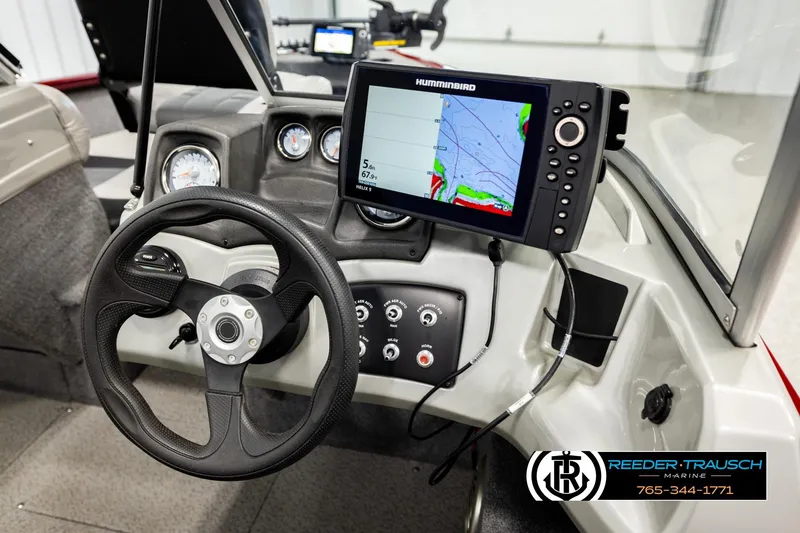 Slide: The Image of 2017 Tracker Pro Guide V-175 Combo boat dashboard with steering wheel and Humminbird fish finder. - 28