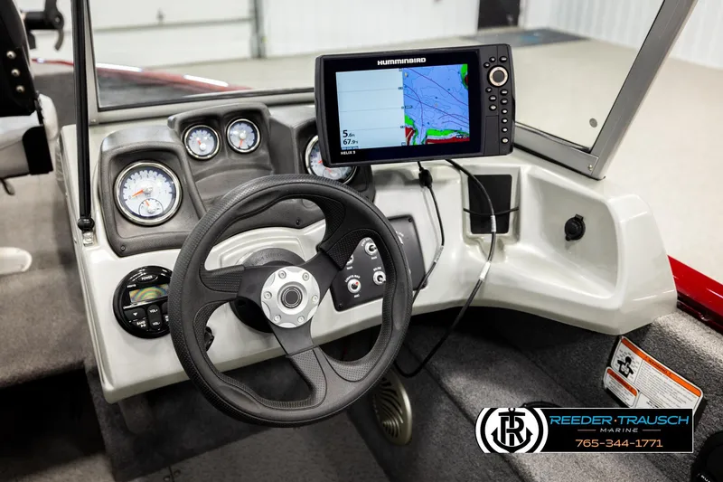 Slide: The Image of 2017 Tracker Pro Guide V-175 Combo dashboard with steering wheel and Humminbird fish finder. - 29