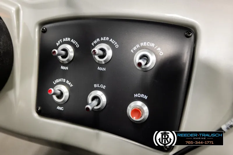 Slide: The Image of Control panel of 2017 Tracker Pro Guide V-175 Combo boat with switches and labels. - 34