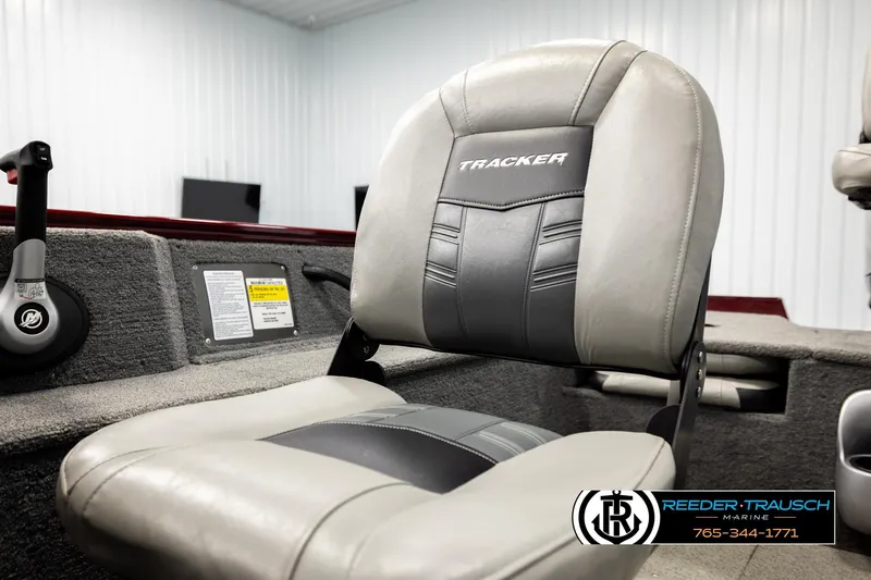 Slide: The Image of 2017 Tracker Pro Guide V-175 Combo boat seat in showroom, featuring Reeder-Trausch Marine branding. - 38