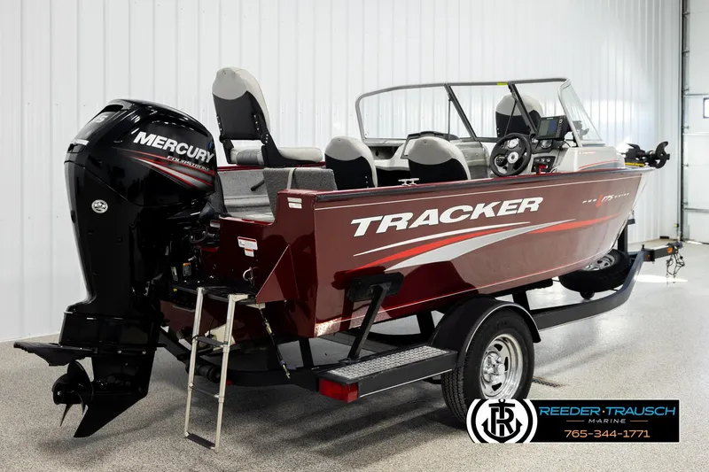 Slide: The Image of 2017 Tracker Pro Guide V-175 Combo boat with Mercury engine in showroom. - 4
