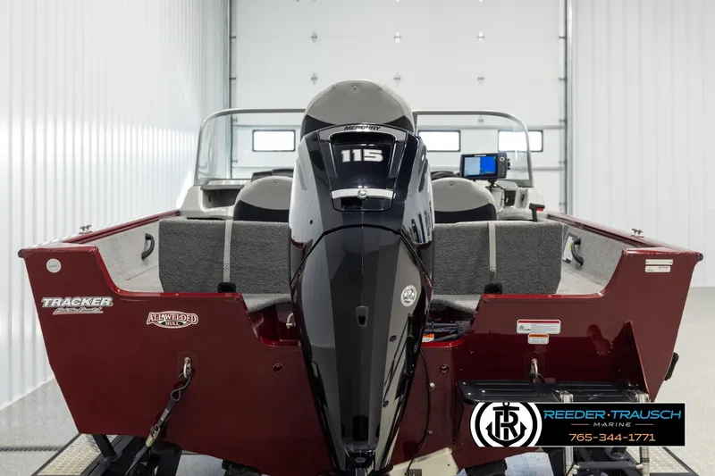 Slide: The Image of 2017 Tracker Pro Guide V-175 Combo boat with Mercury 115 engine in showroom. - 5