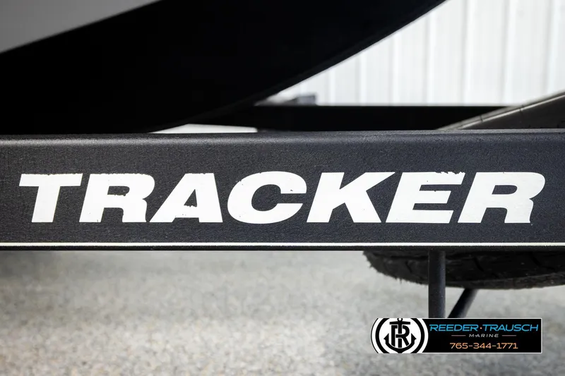 Slide: The Image of 2017 Tracker Pro Guide V-175 Combo trailer with Reeder-Trausch Marine branding. - 55