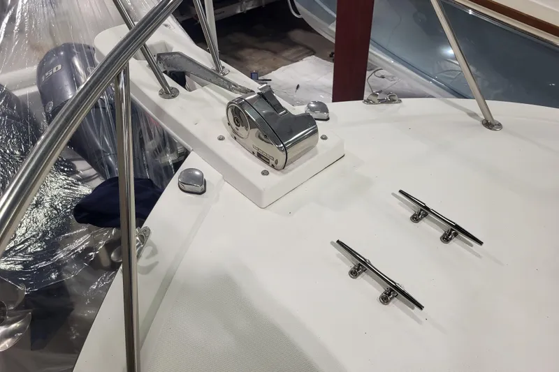 Slide: The Image of 2020 Steiger Craft 31 Miami boat deck with anchor winch and cleats. - 15