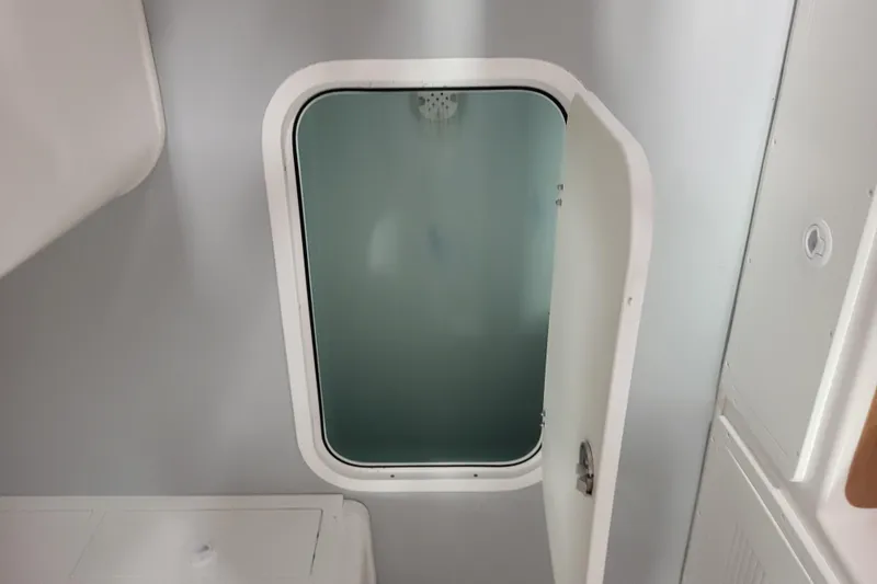 Slide: The Image of Interior cabin door of 2020 Steiger Craft 31 Miami boat. - 32