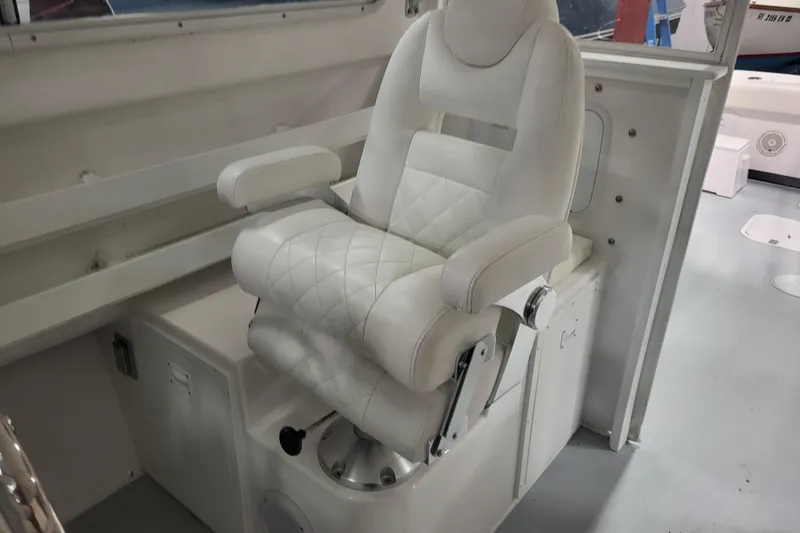 Slide: The Image of Luxurious captain's chair in 2020 Steiger Craft 31 Miami boat interior. - 34