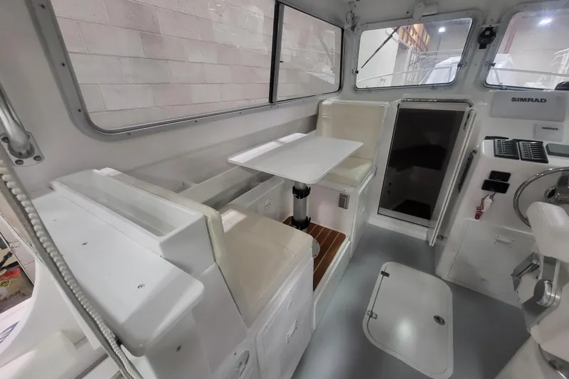 Slide: The Image of Interior of 2020 Steiger Craft 31 Miami boat with seating and navigation equipment. - 37