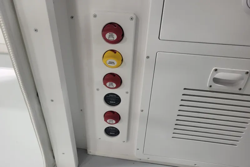 Slide: The Image of Control panel on 2020 Steiger Craft 31 Miami boat with labeled switches. - 43