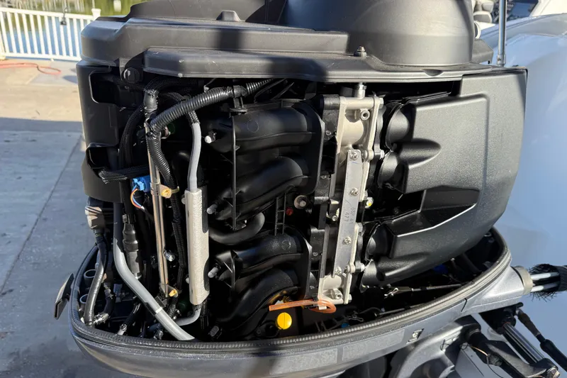 Slide: The Image of 2015 Hurricane SunDeck 2000 OB outboard engine, detailed view of internal components. - 15