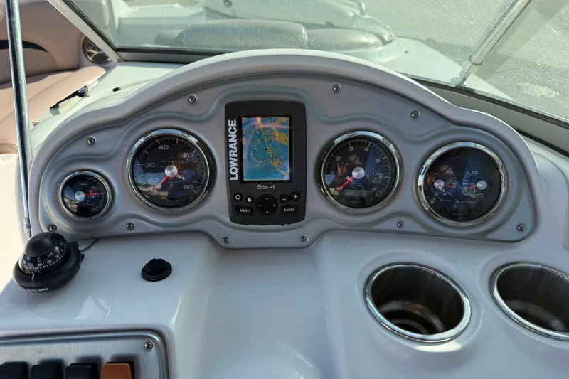 Slide: The Image of Dashboard of 2015 Hurricane SunDeck 2000 OB boat with gauges and Lowrance Elite-4 GPS. - 29