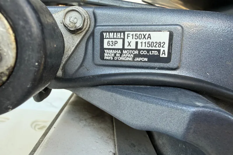 Slide: The Image of Yamaha F150XA engine label on 2015 Hurricane SunDeck 2000 OB boat. - 9