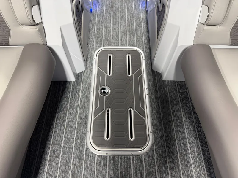 Slide: The Image of Interior of a Premier 250INTRIGUE boat with gray carpet flooring and modern seating. - 35