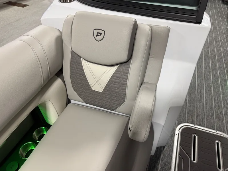 Slide: The Image of Luxurious seating area with gray upholstery and green lighting on a Premier 250INTRIGUE boat. - 22