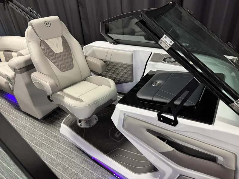 Slide: The Image of Luxurious helm with cushioned seat and modern dashboard in a Premier 250INTRIGUE boat. - 45