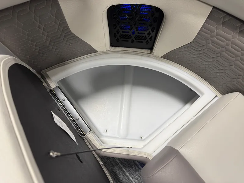 Slide: The Image of The image shows a modern boat seating area with sleek upholstery and blue LED lighting. - 14