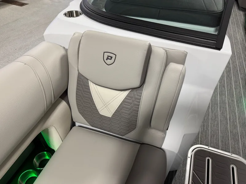Slide: The Image of Luxurious seating area with gray upholstery and green lighting, part of a modern boat. - 21